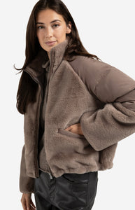 Short teddy jacket with padded sleeves